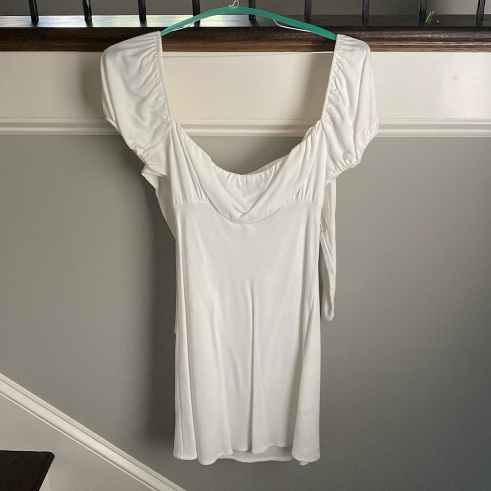 White linen dress with tie in back